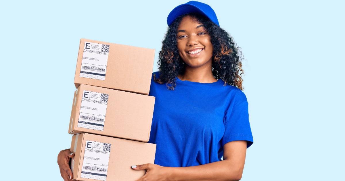 a woman holding boxes for delivery